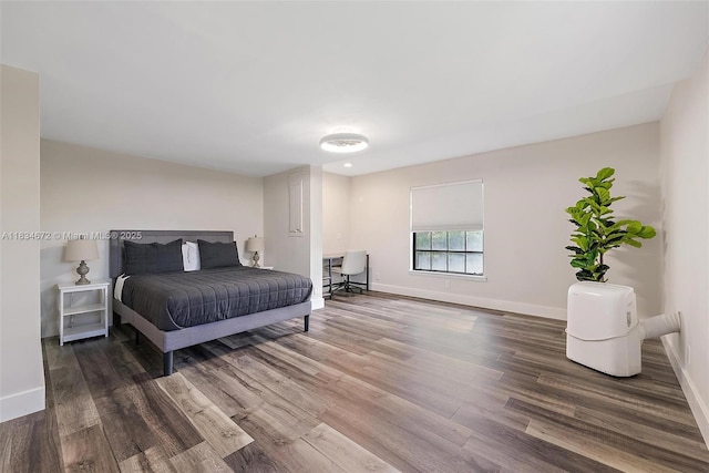 7264 159th Ct N, Palm Beach Gardens, FL 33418 - bedroom featuring wood finished floors and baseboards