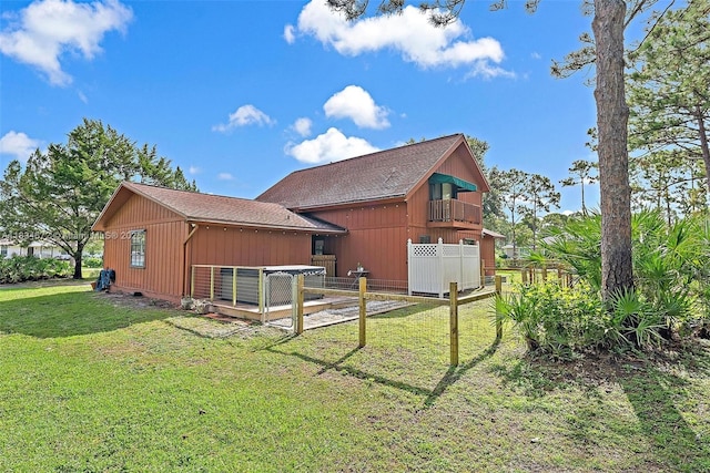 7264 159th Ct N, Palm Beach Gardens, FL 33418 - rear view of house featuring a shingled roof