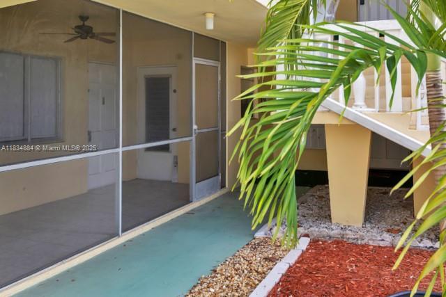 2101 NE 68th St Unit 103, Fort Lauderdale, FL 33308 - property entrance with ceiling fan