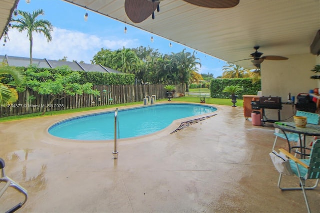 12000 NW 20th St, Pembroke Pines, FL 33026 - view of pool with a ceiling fan, a fenced backyard, and a patio