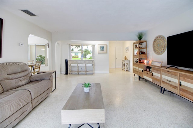 12000 NW 20th St, Pembroke Pines, FL 33026 - living area featuring arched walkways and speckled floor