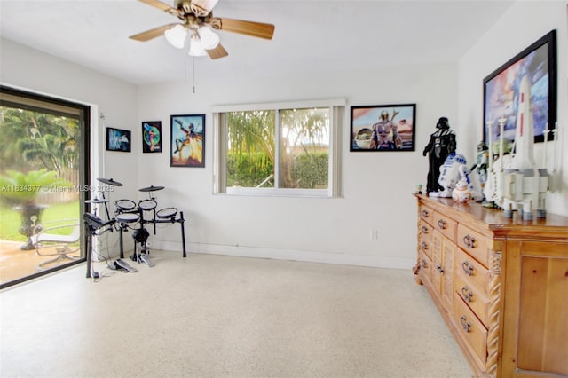 12000 NW 20th St, Pembroke Pines, FL 33026 - living area featuring a ceiling fan and baseboards