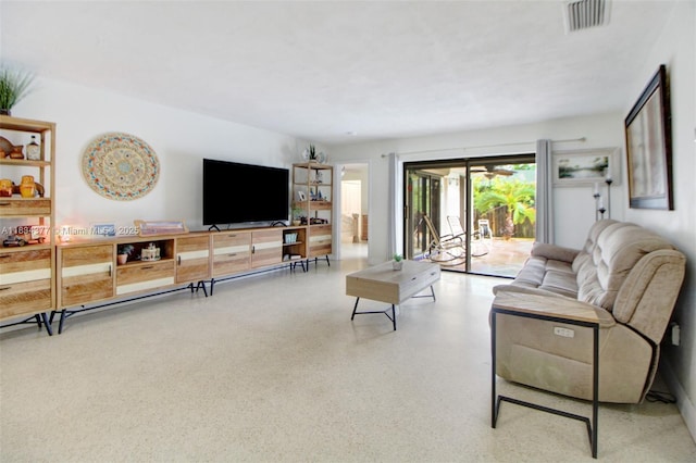 12000 NW 20th St, Pembroke Pines, FL 33026 - living room with speckle patterned floor