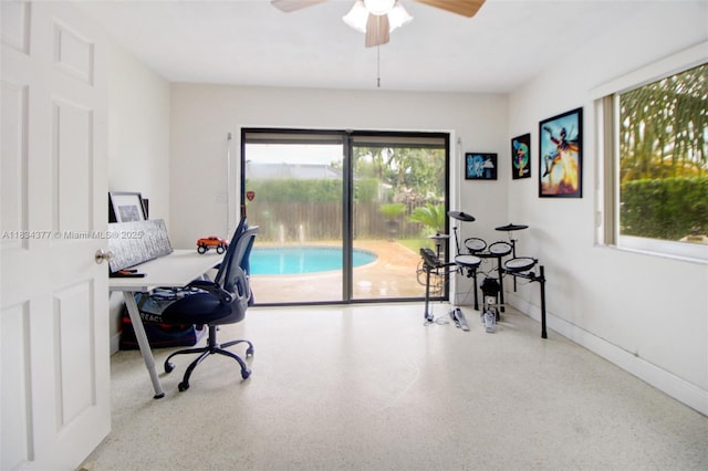 12000 NW 20th St, Pembroke Pines, FL 33026 - office area featuring a ceiling fan and speckle patterned floor