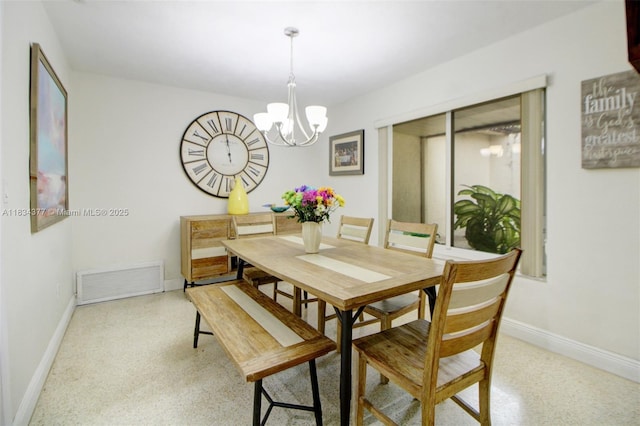 12000 NW 20th St, Pembroke Pines, FL 33026 - dining area featuring a chandelier and dark speckled floor
