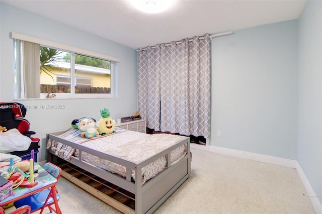 12000 NW 20th St, Pembroke Pines, FL 33026 - bedroom featuring light colored carpet and baseboards