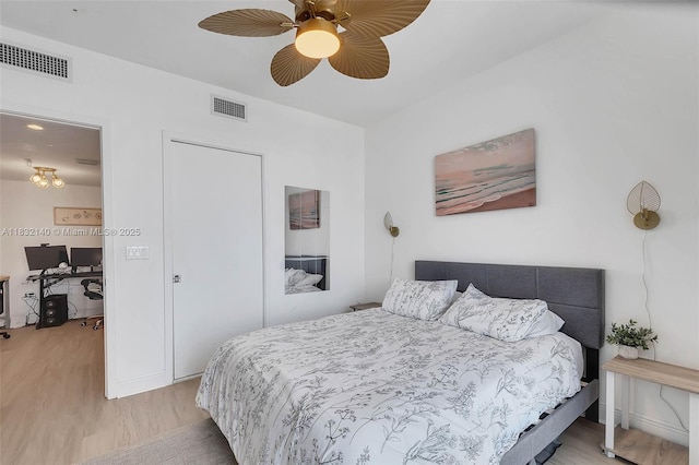185 SW 7th St Unit 2204, Miami, FL 33130 - bedroom featuring light wood-style floors and a ceiling fan