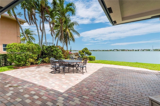 18633 SW 24th St, Miramar, FL 33029 - view of patio featuring outdoor dining area and a water view