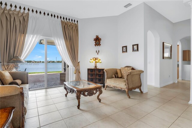 18633 SW 24th St, Miramar, FL 33029 - sitting room with arched walkways, light tile patterned floors, and a water view