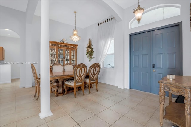 18633 SW 24th St, Miramar, FL 33029 - dining area featuring arched walkways and light tile patterned floors