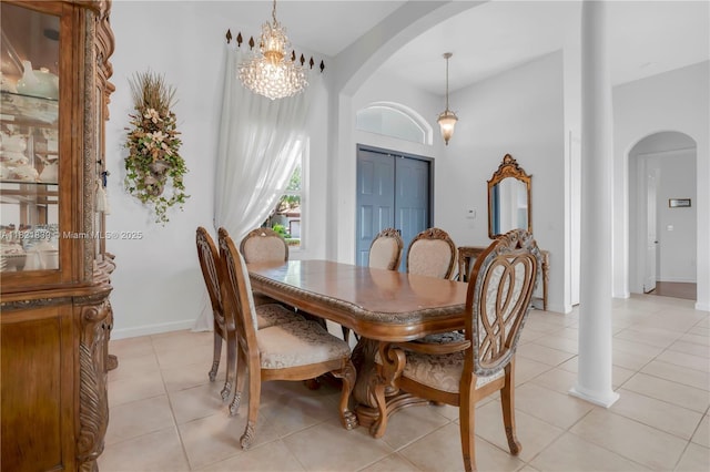 18633 SW 24th St, Miramar, FL 33029 - dining room with arched walkways, light tile patterned floors, and a chandelier