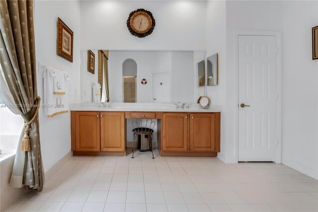 18633 SW 24th St, Miramar, FL 33029 - bathroom featuring double vanity and baseboards