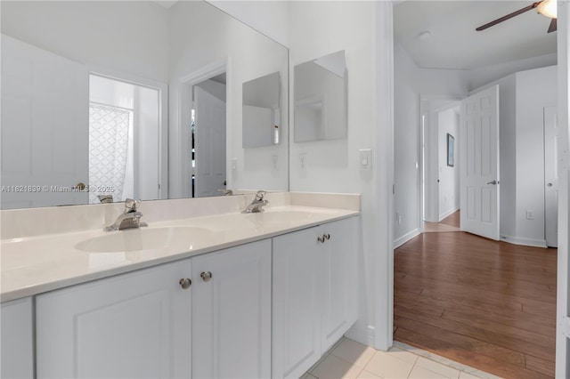 18633 SW 24th St, Miramar, FL 33029 - bathroom featuring double vanity, a ceiling fan, and wood finished floors
