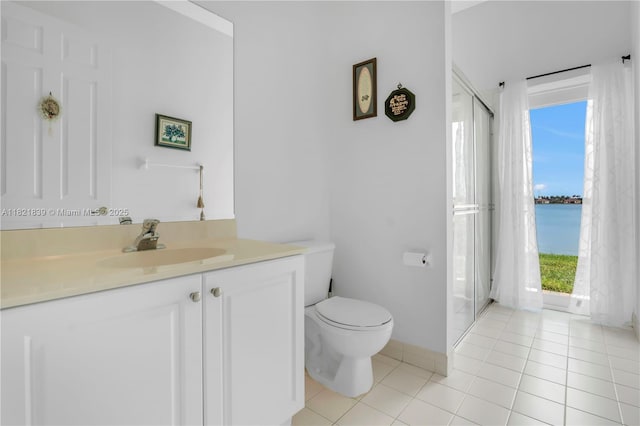 18633 SW 24th St, Miramar, FL 33029 - full bathroom featuring vanity, tile patterned flooring, and a shower with door