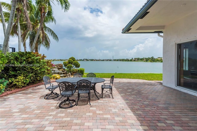 18633 SW 24th St, Miramar, FL 33029 - view of patio featuring outdoor dining area and a water view