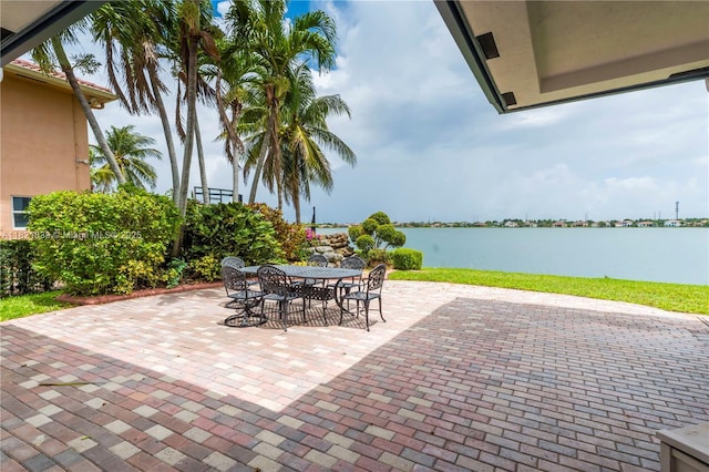18633 SW 24th St, Miramar, FL 33029 - view of patio / terrace featuring outdoor dining area and a water view