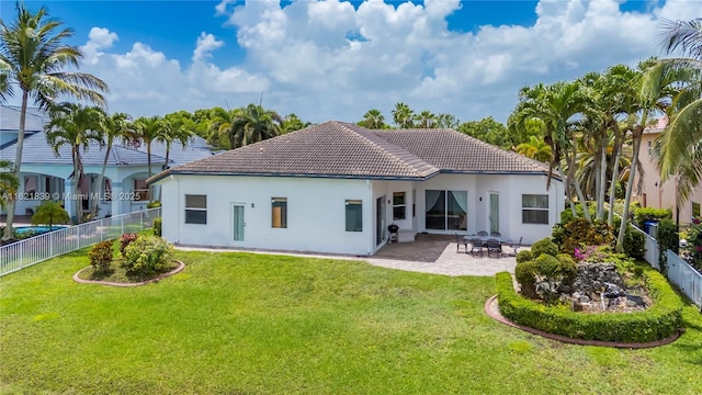 18633 SW 24th St, Miramar, FL 33029 - back of house featuring a tile roof, a fenced backyard, and stucco siding