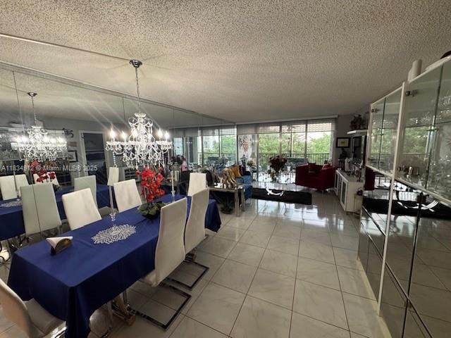 3910 Inverrary Blvd Unit 603-B, Lauderhill, FL 33319 - dining space featuring a chandelier and a textured ceiling