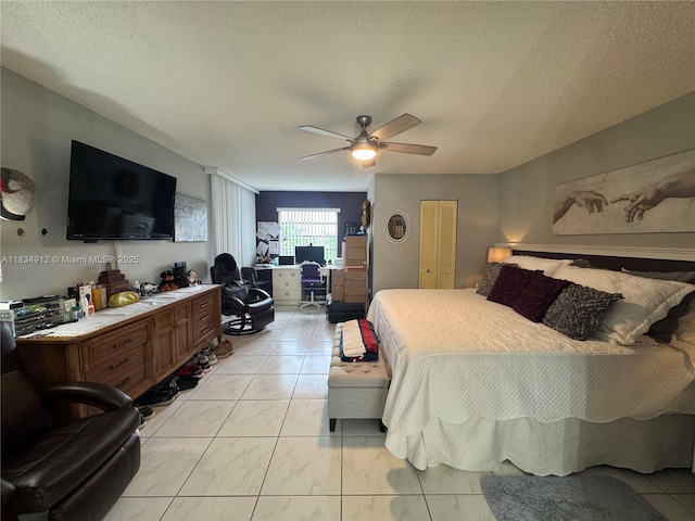 3910 Inverrary Blvd Unit 603-B, Lauderhill, FL 33319 - bedroom featuring a textured ceiling and ceiling fan