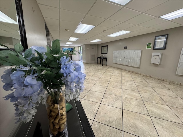 3910 Inverrary Blvd Unit 603-B, Lauderhill, FL 33319 - spare room featuring mail area, a drop ceiling, and light tile patterned floors