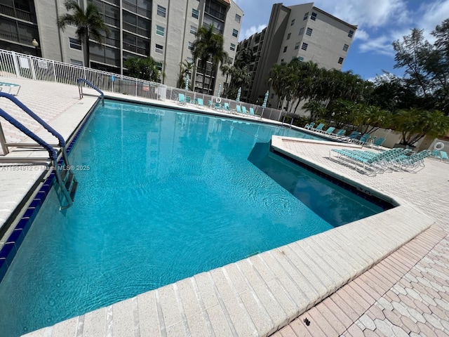 3910 Inverrary Blvd Unit 603-B, Lauderhill, FL 33319 - community pool with a patio area and a jacuzzi