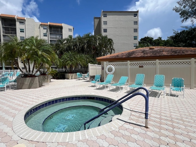 3910 Inverrary Blvd Unit 603-B, Lauderhill, FL 33319 - view of pool featuring a community hot tub, a patio area, and a pool