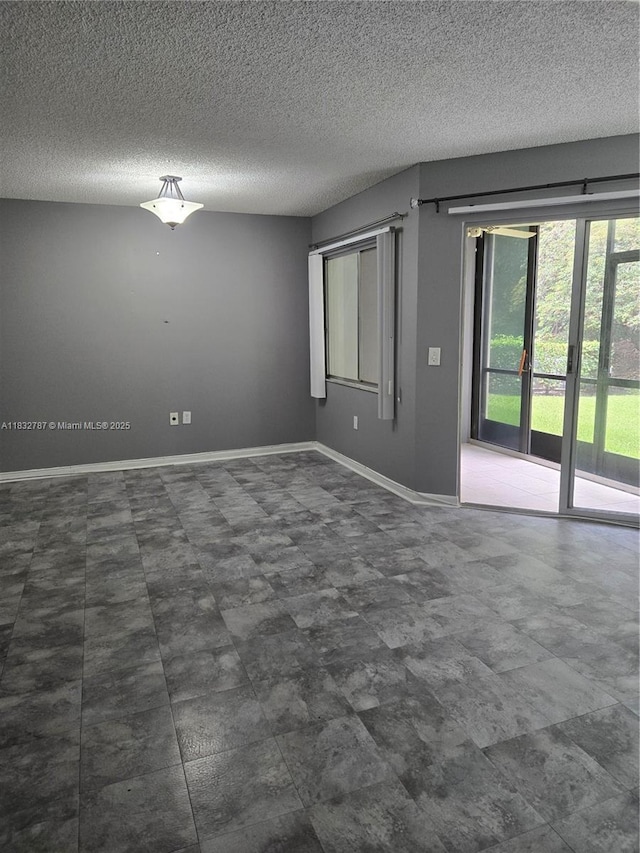 800 SW 142nd Ave Unit N111, Pembroke Pines, FL 33027 - empty room featuring a textured ceiling