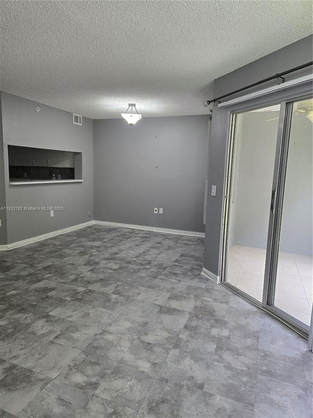 800 SW 142nd Ave Unit N111, Pembroke Pines, FL 33027 - unfurnished room with a textured ceiling
