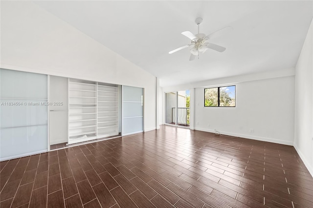 20218 NE 34th Ct Unit 52, Aventura, FL 33180 - unfurnished bedroom with vaulted ceiling, dark wood-type flooring, a closet, ceiling fan, and access to exterior