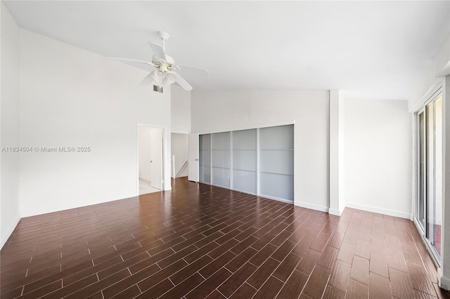 20218 NE 34th Ct Unit 52, Aventura, FL 33180 - unfurnished bedroom featuring wood finished floors, a closet, a ceiling fan, and vaulted ceiling