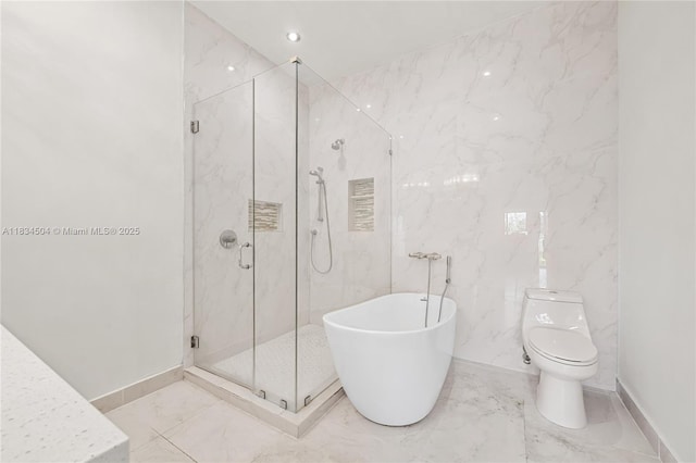 20218 NE 34th Ct Unit 52, Aventura, FL 33180 - bathroom with marble tiled floors, a marble finish shower, a soaking tub, and vanity