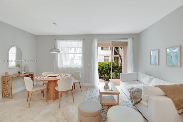 3205 NE 184th St Unit 9106, Aventura, FL 33160 - living area featuring baseboards