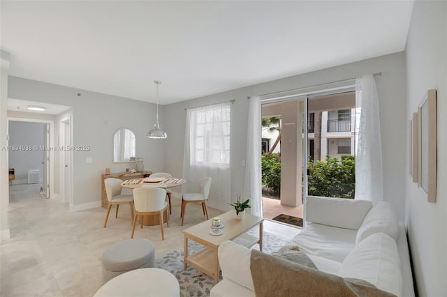 3205 NE 184th St Unit 9106, Aventura, FL 33160 - living room featuring baseboards