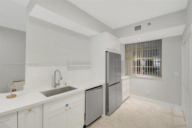 3205 NE 184th St Unit 9106, Aventura, FL 33160 - kitchen featuring appliances with stainless steel finishes, white cabinetry, light countertops, and open shelves