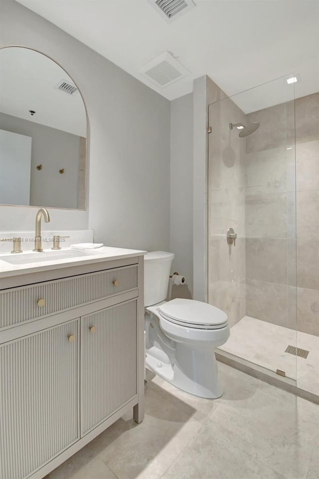 3205 NE 184th St Unit 9106, Aventura, FL 33160 - bathroom with a tile shower, vanity, and tile patterned floors
