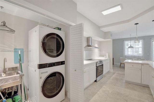 3205 NE 184th St Unit 9106, Aventura, FL 33160 - laundry area with stacked washer and clothes dryer