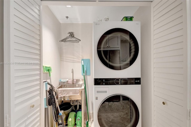 3205 NE 184th St Unit 9106, Aventura, FL 33160 - laundry room featuring stacked washer / drying machine