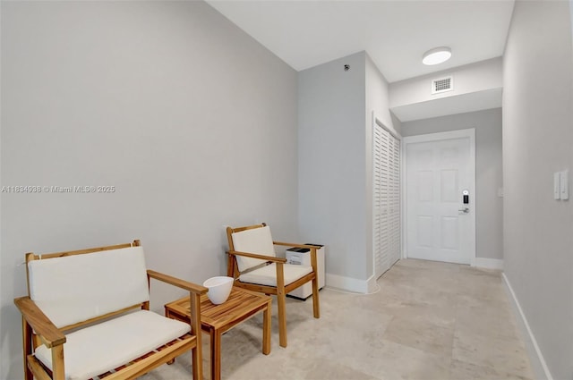 3205 NE 184th St Unit 9106, Aventura, FL 33160 - sitting room featuring baseboards