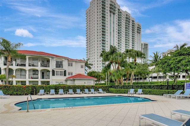 3205 NE 184th St Unit 9106, Aventura, FL 33160 - community pool featuring a patio area