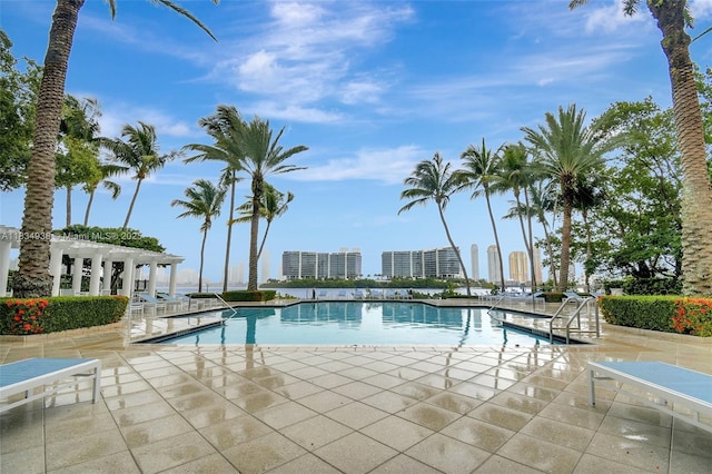 3205 NE 184th St Unit 9106, Aventura, FL 33160 - community pool featuring a patio area and a view of city