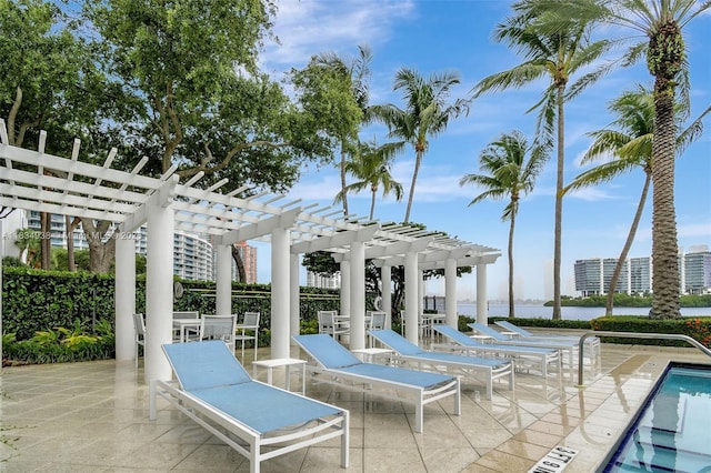 3205 NE 184th St Unit 9106, Aventura, FL 33160 - view of patio featuring a pergola, a water view, and a community pool