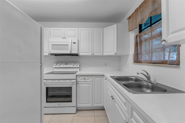 13926 SW 46th Ter Unit A 351, Miami, FL 33175 - kitchen with white appliances, white cabinets, and light tile patterned floors