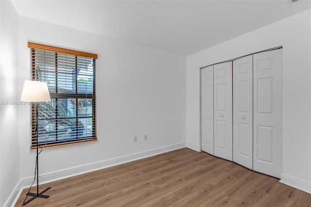 13926 SW 46th Ter Unit A 351, Miami, FL 33175 - unfurnished bedroom featuring wood finished floors and a closet