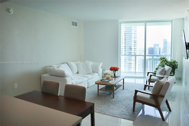 1900 N Bayshore Dr Unit 3804, Miami, FL 33132 - tiled living area featuring floor to ceiling windows, plenty of natural light, and a view of city