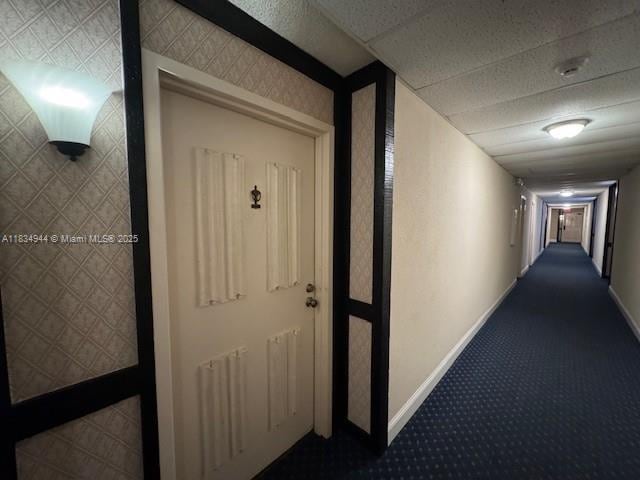 3690 Inverrary Dr Unit 1T, Lauderhill, FL 33319 - hall featuring baseboards and dark colored carpet