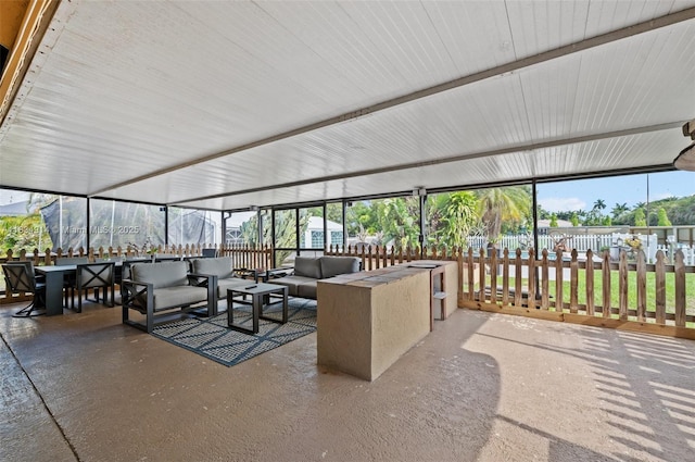 14040 SW 14th St, Davie, FL 33325 - sunroom featuring an outdoor living space and outdoor dining area