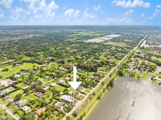 14040 SW 14th St, Davie, FL 33325 - aerial perspective of suburban area with a large body of water