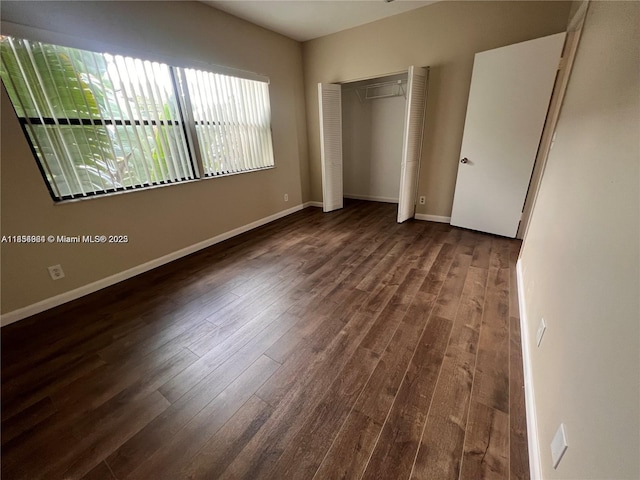 3016 NE 21st Ter Unit 3016, Fort Lauderdale, FL 33306 - unfurnished bedroom with wood finished floors and a closet