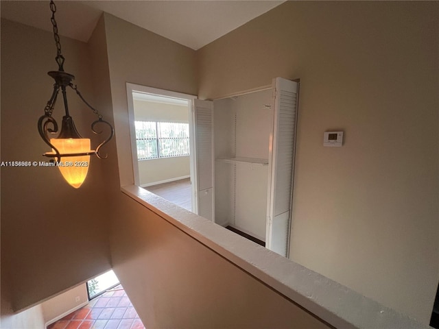 3016 NE 21st Ter Unit 3016, Fort Lauderdale, FL 33306 - hall featuring baseboards and tile patterned floors