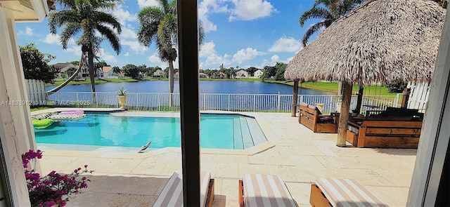 3460 SW 52nd St, Hollywood, FL 33312 - view of swimming pool featuring a water view, a patio area, a fenced backyard, and a gazebo